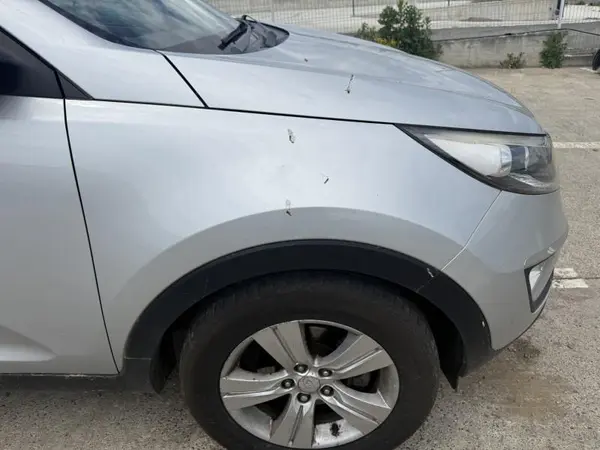 Aripa fata dreapta culoare argintie Kia Sportage (2010-2015)