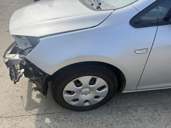 Aripa fata stanga culoare argintie - gan (176) Opel Astra J (2009-2012)
