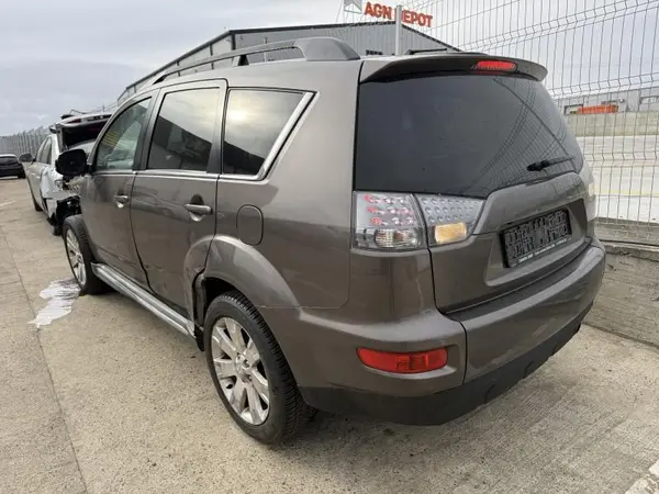 Aripa spate stanga culoare maro Citroen C-Crosser (2007-2012)