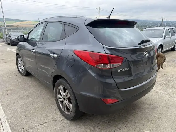 Aripa spate stanga culoare midnight black Hyundai ix35 facelift (2013-2015)
