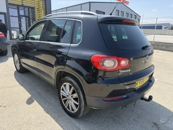 Aripa spate stanga culoare negru - lc9x Volkswagen Tiguan (2007-2011)