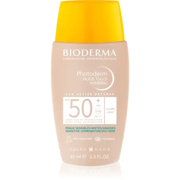 Bioderma Photoderm Nude Touch fluid tonifiant de protecție pentru piele mixtă și grasă SPF 50+ culoare Light Colour 40 ml