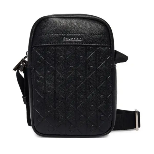 Borseta Calvin Klein EMBLEM AOP EMBOSS SLIM REPORTER