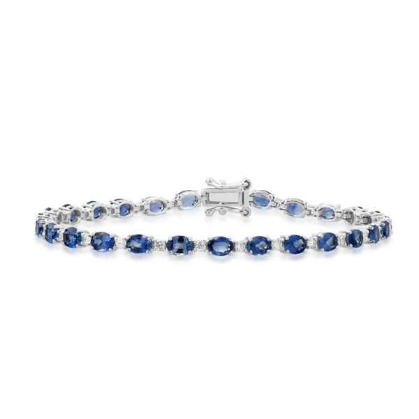 Bratara tennis din aur alb cu safire albastru deschis ovale de 6.25ct si diamante de 0.6ct