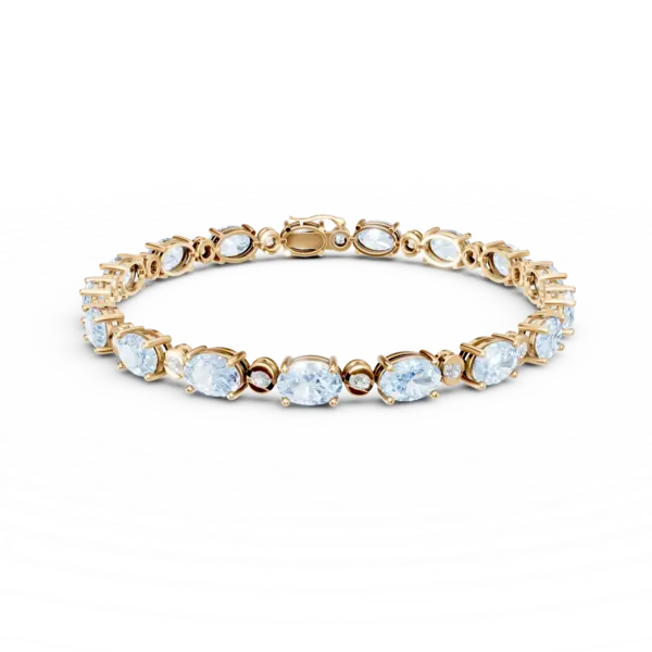 Bratara tennis din aur galben cu topaze albastre ovale de 14.8ct si diamante de 0.3ct
