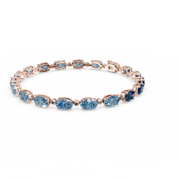 Bratara tennis din aur roz cu topaze albastre ovale de 20.9ct si diamante de 0.3ct