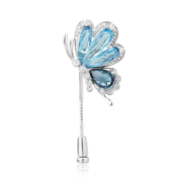 Brosa fluture din aur alb cu topaze de 7ct si diamante de 0.3ct