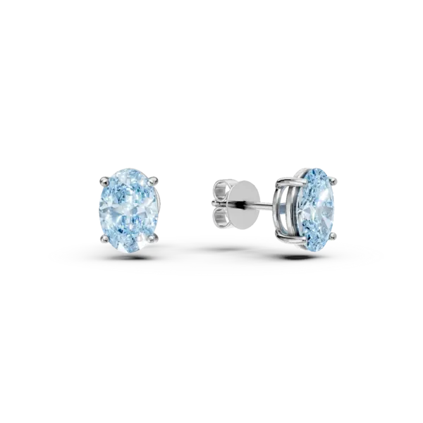 Cercei stud din aur alb cu topaze london blue ovale de 1.1ct