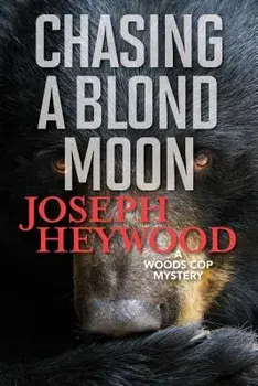 Chasing a Blond Moon: A Woods Cop Mystery, Paperback/Joseph Heywood