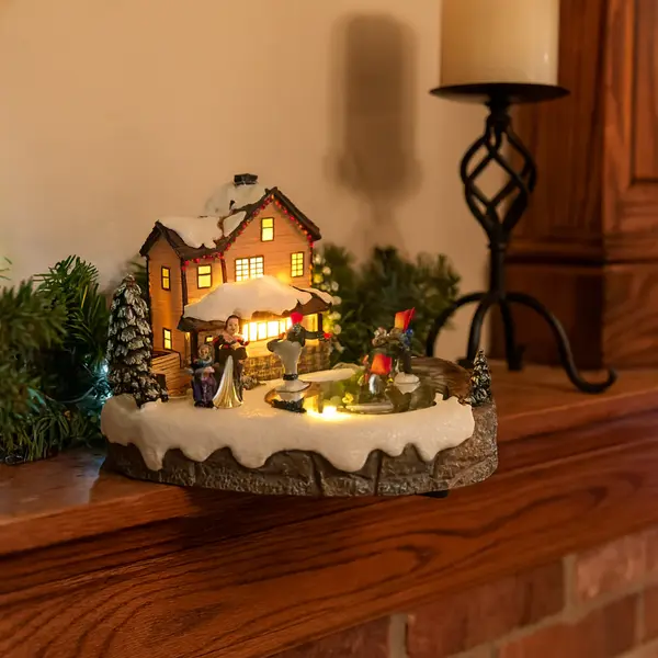 Decoratiune Craciun cu Casuta Luminata si patinatori – platforma rotativa iluminata si melodii de Craciun