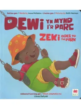 Dewi yn Mynd i'r Parc / Zeki Goes to the Park, Paperback/Anna McQuinn