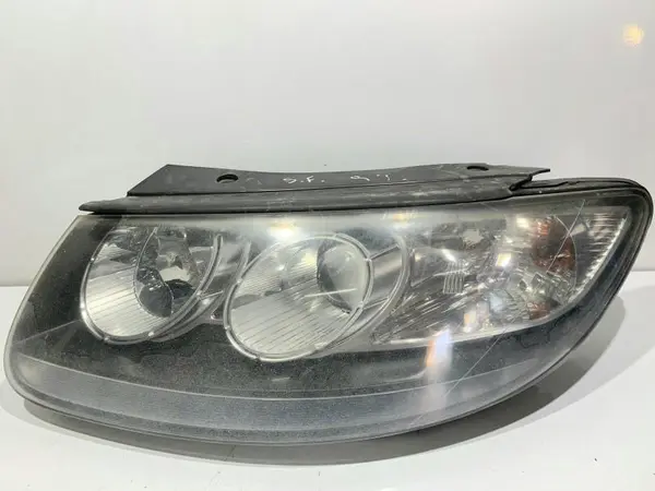 Far stanga cu lupa Hyundai Santa Fe 2 (2006-2012)