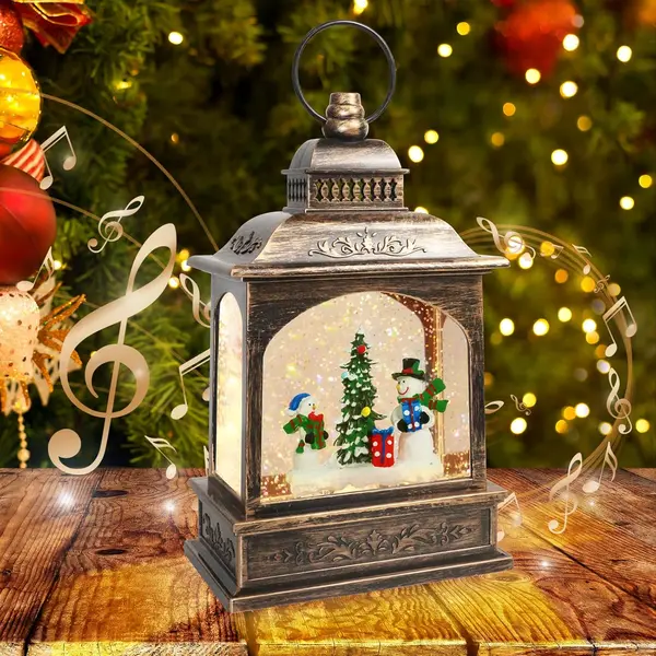Glob de zapada muzical de Craciun cu om de zapada – lumini calde, efect de ninsoare si 8 melodii festive