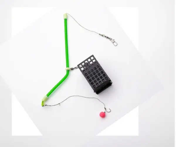 Montura Accesorii pescuit > Nada si momeli cu cosulet pentru crap carlig legat cu spin