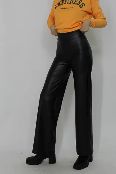 Pantaloni evazati Aris, din piele ecologica, cu banda elastica in talie, Negru
