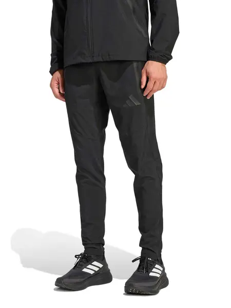 Pantaloni sport Tiro Travel Woven