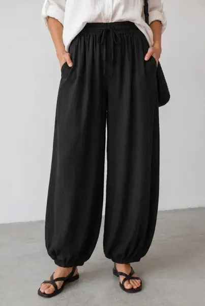 Pantaloni tip balon din lyocell cu talie elastica si buzunare, negri