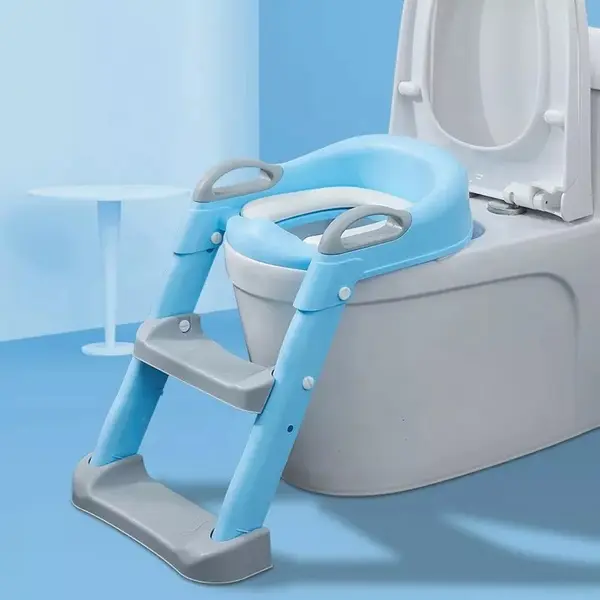 Reductor toaleta pentru copii Little Mom Grow Up Blue, pliabil, cu manere ergonomice si treapta reglabila pe 2 nivele de inaltime, colac moale din spuma PU, design anti-stropire, compatibilitate universala