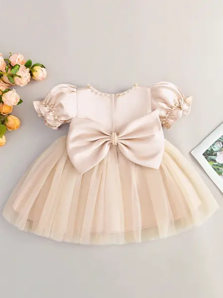 Rochie cu fundita din tiul - sampanie / 12-18 luni (80-86 cm)