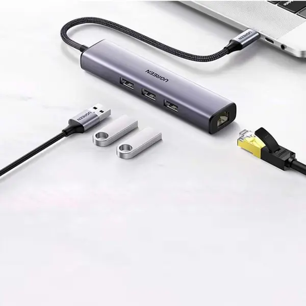 Ugreen ADAPTOR RETEA Ugreen, cm475 extern, USB 3.0 (T) la port Gigabit RJ-45, porturi USB: USB 3.0 x 3, USB Type-C x 1, argintiu 60554